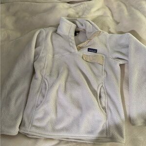 Off-white/cream Patagonia fleece pullover with pocket in great condition